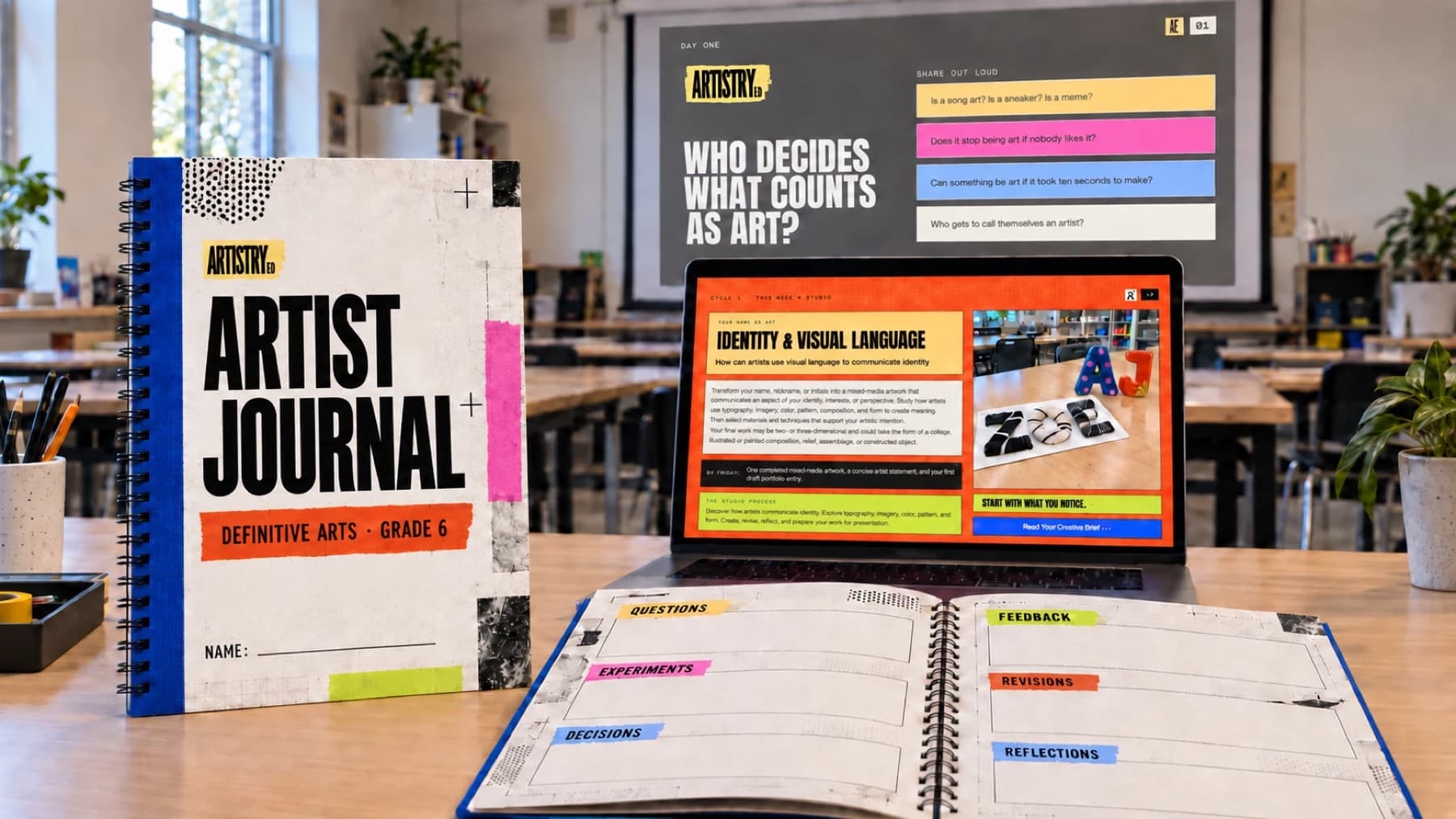 An Artistry Ed Artist Journal, a lesson on a laptop and the day-one question on a classroom projector